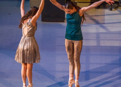 As we carry on, our two female dancers embrace one another. Photo: Talyn Sherer