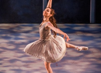 She balances delicately on the points of her toes as her pirouette begins. Photo: Talyn Sherer