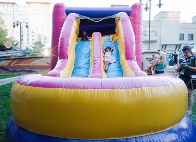 Cruising down the blow-up slide. Photo: JoSavagePhotography.com