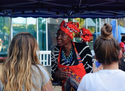 Cathy Tshilombo-Lokemba, of Mama Africa Grill, takes a customer's order at DIY Fest. Photo: @snowlenda