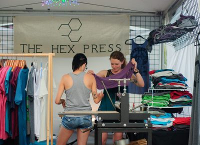 Makers at The Hex Press work on a design during DIY Fest. @snowlenda