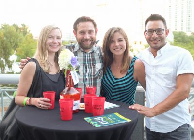 (L–R) Michelle Buhler, Nic Kanaanan, Kate Craft and Jeremey Rosen enjoy some Maker’s Mark cocktails on Craft Lake City’s VIP Patio. And for a look at Craft’s craftiness, visit the glowsugar.com website to see her electro-luminescent clothing modifications. Photo: John Barkiple