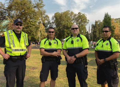 Officers of the SLPD station for the Twilight Concert Series. Photo: Logan Sorenson / @Lmsorenson