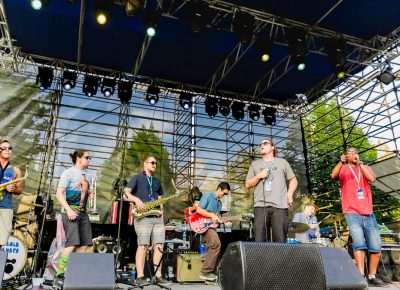 Grits Green onstage at the Twilight Concert Series. Photo: Logan Sorenson / @Lmsorenson