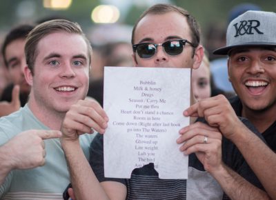 Lucky fans Dawson, Mason and Diogo were able to snag Anderson .Paak's set list. Photo: Colton Marsala