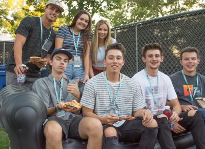 (Top L-R) Noah, Mandie, Melody, (Bottom L-R) Andrew, Ryan, Tanner, Adam hanging out in the Sponsor Lounge, enjoying fresh local pizza. Photo: Colton Marsala