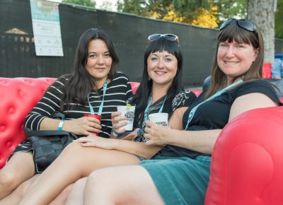 (L–R) Breanna, Randi, and Amy relax in the Sponsor's Lounge. Photo: Colton Marsala