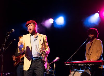 Lead singer Lech Wierzynski swapped from his guitar, to tambourine and trumpet, several times during the performance. Photo: JoSavagePhotography.com