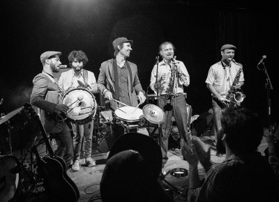 The Honeydrops are seen on the move to descend the stage and play on a dance floor party. Photo: JoSavagePhotography.com