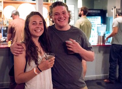 Katie Hawley and Alex Lazar enjoy beverages and good company prior to the music in the bar/hang-out area. Photo: JoSavagePhotography.com