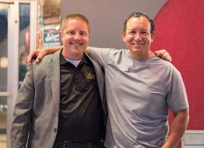 Austin Decker, a State Room employee, and Lucio Huizar hang out in front of the venue prior to the show. Photo: JoSavagePhotography.com