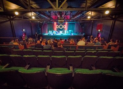 Guests lounge on the church pews and old movie recliners and socialize prior to the music. Photo: JoSavagePhotography.com