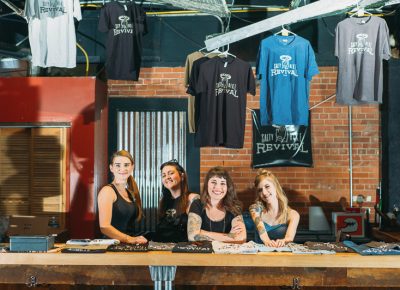 (L–R) SBR volunteers Ana Mann, Sam "Bronco" Maclin, Raquel Baker and Annie Davis were at the merch booth slinging' SBR swag. Photo: @clancycoop