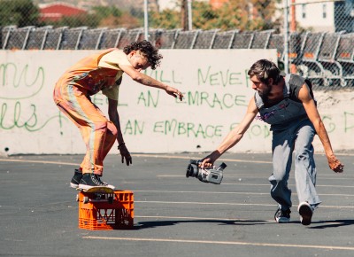 Willy films Joey Sandoval as he powerslides with a crate. Photo: Niels Jensen