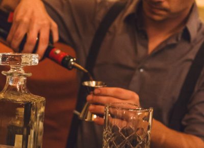 The bartender prepares my favorite cocktail, The Black Manhattan, which features Honest John’s black walnut bitters. Photo: Talyn Sherer