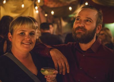 (L–R) April Gaultney smiles for the camera while John Zebra dreams of his next cocktail. Photo: Talyn Sherer