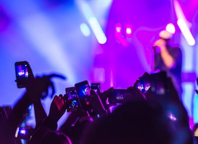 Fans quickly snap photos and grab video of Mac Miller’s performance and lightshow. Photo: ColtonMarsalaPhotography.com