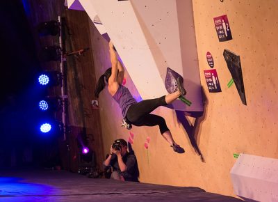 Nina Williams holds a strong toe hook on the first problem. Photo: ColtonMarsalaPhotography.com