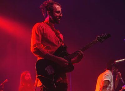 Jacob Tilley of Young the Giant stares intently at the sea of people screaming beneath him. Photo: Talyn Sherer.