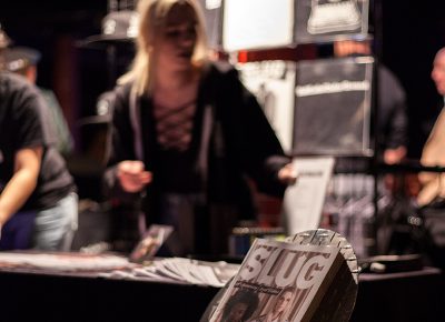 The badass SLUG Mag booth selling merch. Photo: CJ Anderson