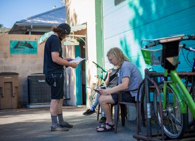 At Saturday Cycles, trying to decipher the map. Photo: @ca_visual