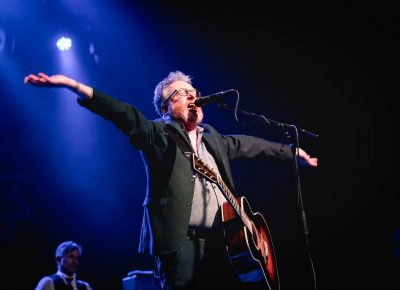 Flogging Molly playing in SLC, asking audience members to clap along. Photo: Lmsorenson.net