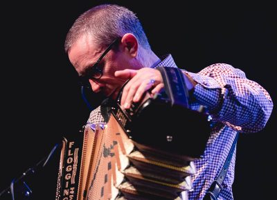 Matt Hensley of Flogging Molly providing the essential accordion sound to the stage. Photo: Lmsorenson.net