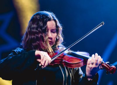 Fiddle player Bridget Regan—an absolute essential piece of the large ensemble that is Flogging Molly. Photo: Lmsorenson.net