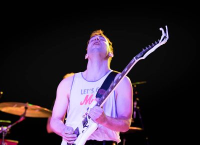 Jack Antonoff wailing on the guitar and running around stage. Photo: Logan Sorenson / Lmsorenson.net