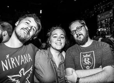 Brad, Jessie and Matt waiting at the front of the stage to see the Gimme Gimmes. Photo: Gilbert Cisneros