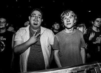 Glenn and Reid waited front row to catch the Gimme Gimmes. Photo: Gilbert Cisneros