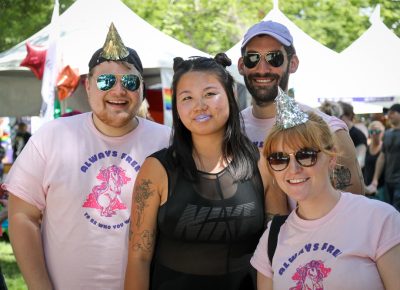 (L–R) Thomas Welch, Kathy Zhou, Sam Feinman and Vreni Romang tour the Pride Festival after the parade. Photo: John Barkiple