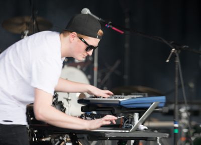 Keyboardist for RKDN playing during the opening set at Ogden Twilight. Photo: Lmsorenson.net