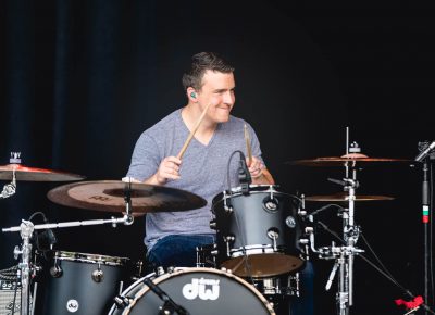 Drummer for RKDN definitely enjoying the evening at Ogden Amphitheater. Photo: Lmsorenson.net