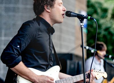 Damien Kulash of OK Go and guitarist Andy Ross on stage at Ogden Twilight. Photo: Lmsorenson.net