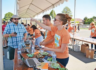 Along with music, food, puppies and games, this August’s 8th Annual Utah Beer Festival will bring together close to 70 local and national breweries and cideries. Photo courtesy of City Weekly.