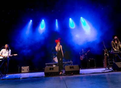 Headliner Wild Belle playing onstage at Ogden Twilight. Photo: Lmsorenson.net