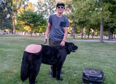 Brandis Smith and funny pup, Skeena, hold down the hot-dog cooking at the grill. Photo: Jo Savage // @SavageDangerWolf