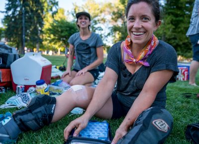 Becky Hedrick uses the first aid kit to cover a battle wound. Photo: Jo Savage // @SavageDangerWolf