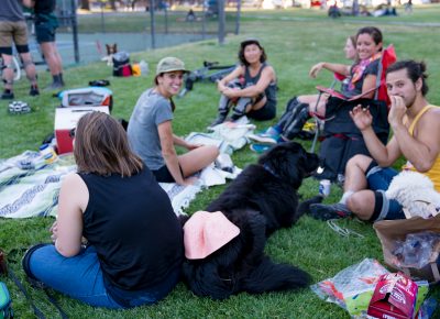 Polo members hang in the grass when it is not their turn to play and snack and chat. Photo: Jo Savage // @SavageDangerWolf