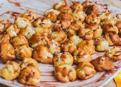 Taking the food scene by storm the chefs over at Park City Culinary Institute left a lasting impression with their Vino Cotto Profiteroles, stuffed with goat cheese, cream cheese, red and yellow bell peppers, parsley chives and vino cotto. Photo: Talyn Sherer