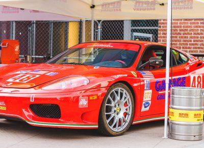 The Garage Grill showcased their badass Ferrari, which rested at the shoulder of the RPM Brewery stand. Photo: Talyn Sherer