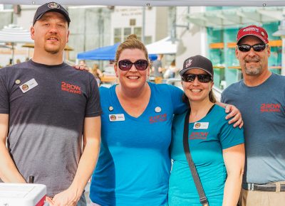 (L–R) Mark Butler, DeDe Edeman (owner), Lori Kunz and Kevin Engel are part of the ever expanding staff of 2 Row Brewing. Photo: Talyn Sherer