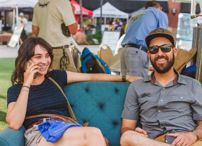 (L–R) Hellen Finch and Nic Hummel chill on the sofas with their SaltFire Brewing swag. Photo: Talyn Sherer