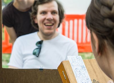 Fun times at the Hand Drawn Photo Booth. Photo: ColtonMarsalaPhotography.com