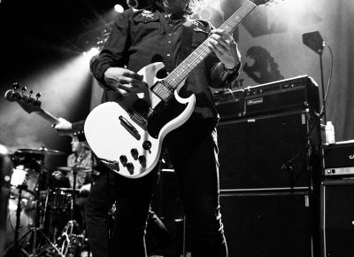 Ken Horne on guitar for The Bronx. Photo: Gilbert Cisneros