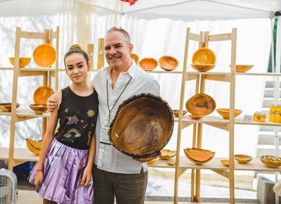 (L–R) Daughter Hadley Peck poses with her father and artist Alan Peck, who founded Peck’s Vanilla, HASHI Chopsticks and Beehive Bowls. Photo: @taylnshererphoto