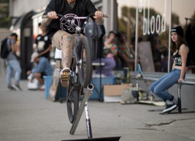 Meth & Macaroni’s Byron Sorensen rides an impromptu rail in front of Gold Blood on 1526 South State. He explained M&M’s origin story as a low-rent homage to Crooks and Castles’ COCAINE & Caviar merchandise. Photo: John Barkiple