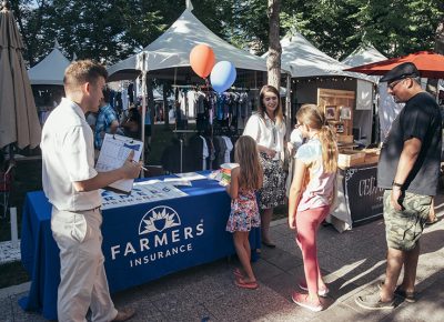 Farmers Insurance greeting visitors with welcoming smiles. Photo: @william.h.cannon