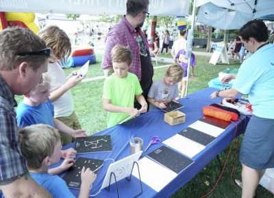 Kids having fun in the crafts portion in the Kids' Area. Photo: @jaysonrossphoto